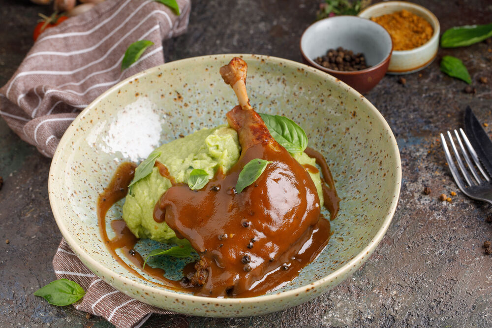 Duck leg with basil puree