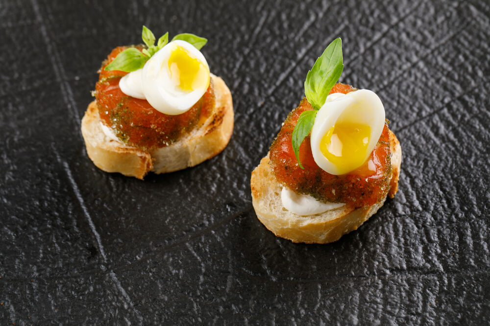 Salmon, pesto and poached egg canapes