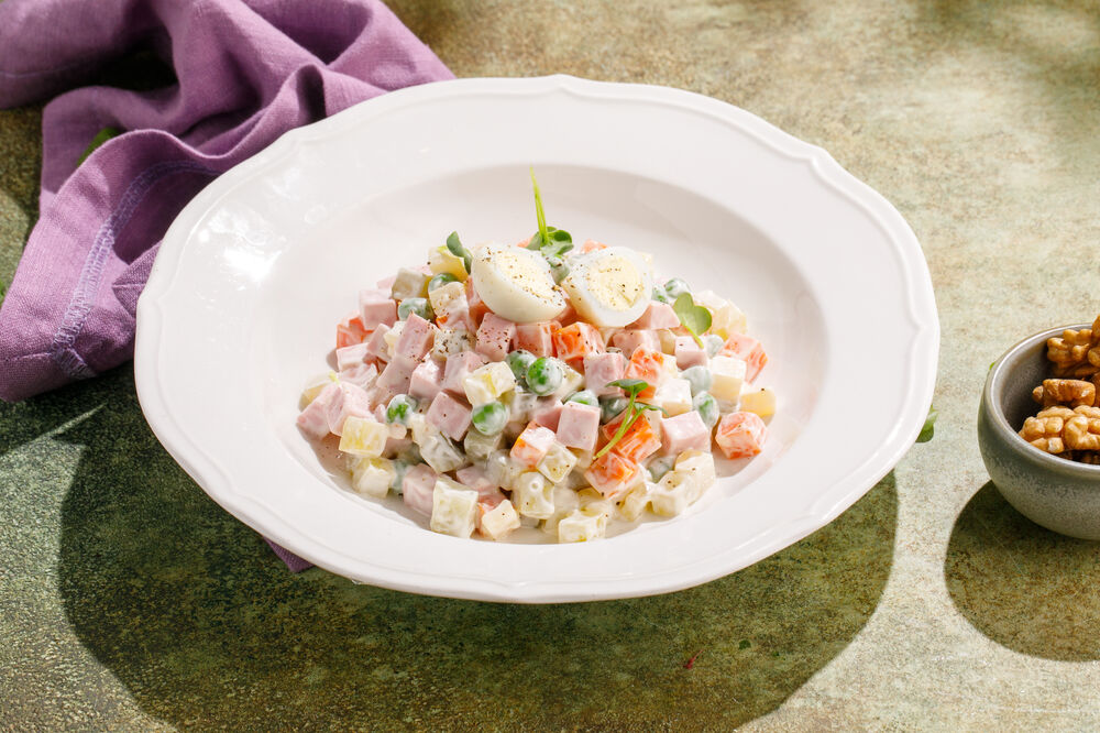 Olivier salad with quail eggs