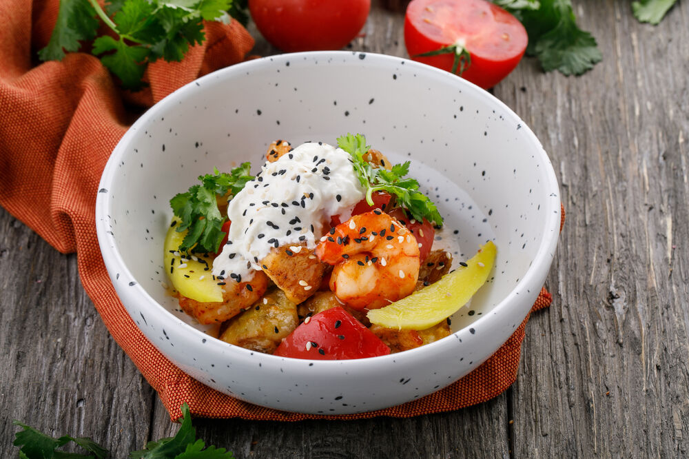 Salad with crispy eggplant , prawns and farm cheese