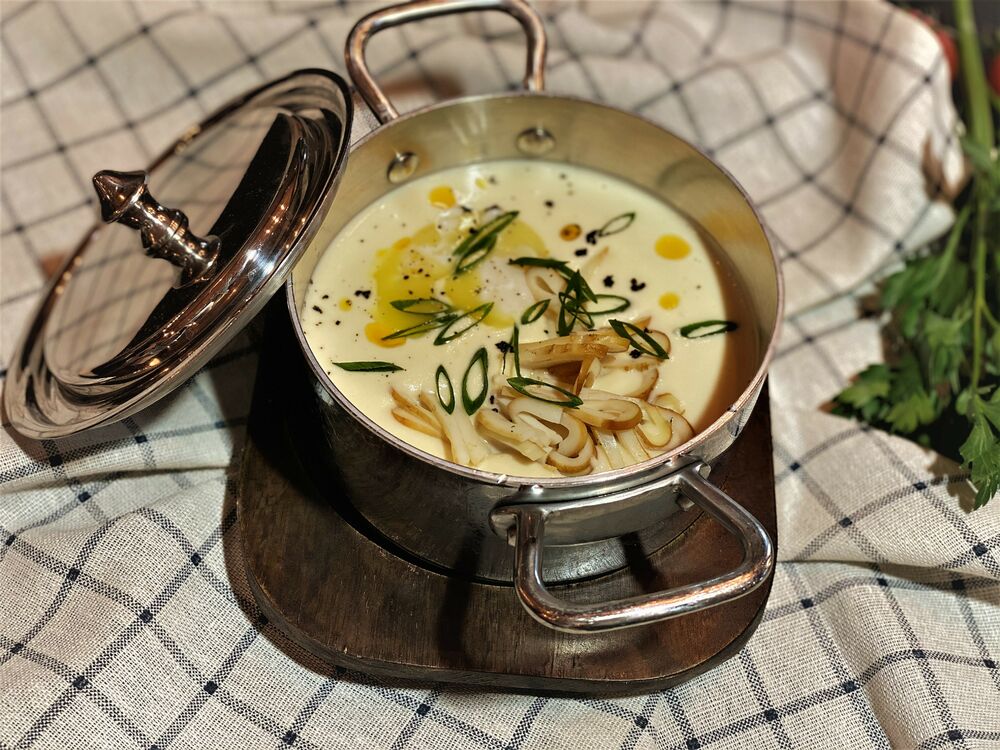 Celery cream soup with smoked squid