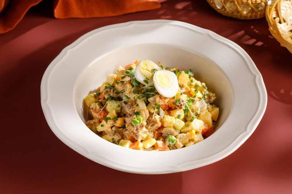 Olivier salad with smoked chicken