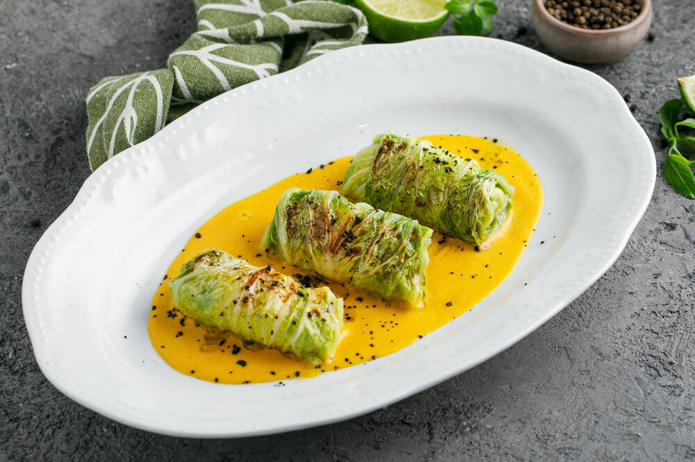 Stuffed cabbage rolls with cancer necks