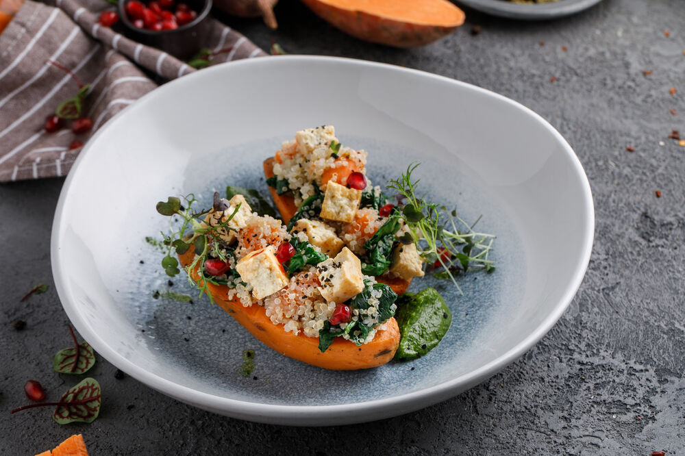 Baked Sweet potato with quinoa, spinach and pickled tofu