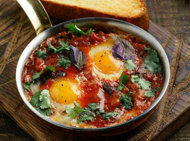Chibruli with tomatoes and fragrant herbs