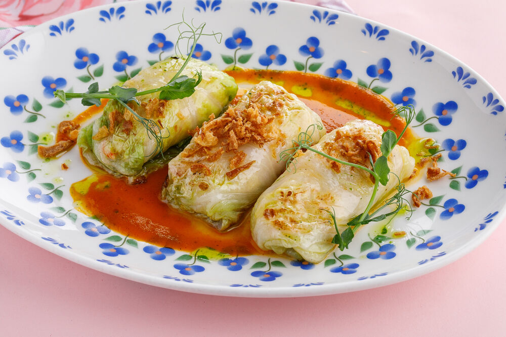Crab neck stuffed cabbage rolls with Bisque sauce