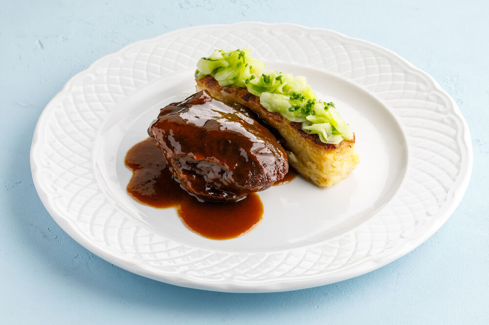 Veal cheeks with potato gratin and  Norwegian- style cucumbers 