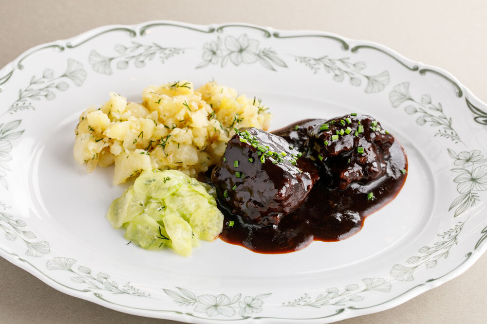 Veal cheeks with potato and  Norwegian- style cucumbers 