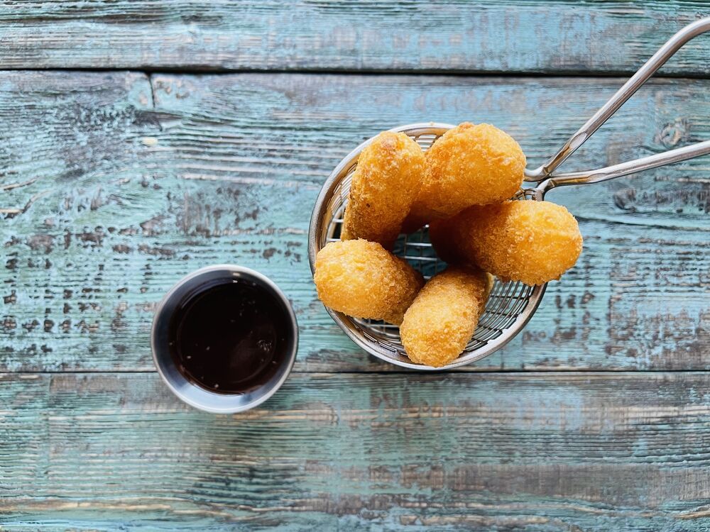 Fried cheese with lingonberry sauce