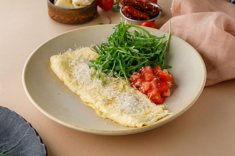 Truffle omelet with tomato salsa and parmesan