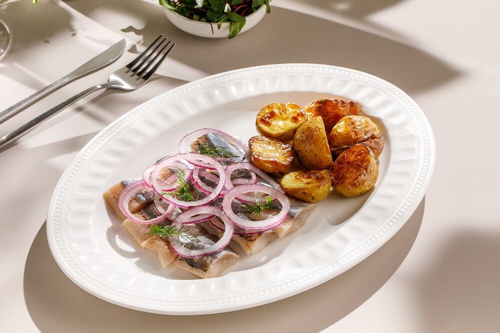 Olyutor herring with baked potatoes