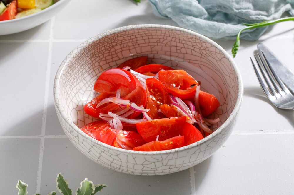 Baku tomatoes and red onion salad