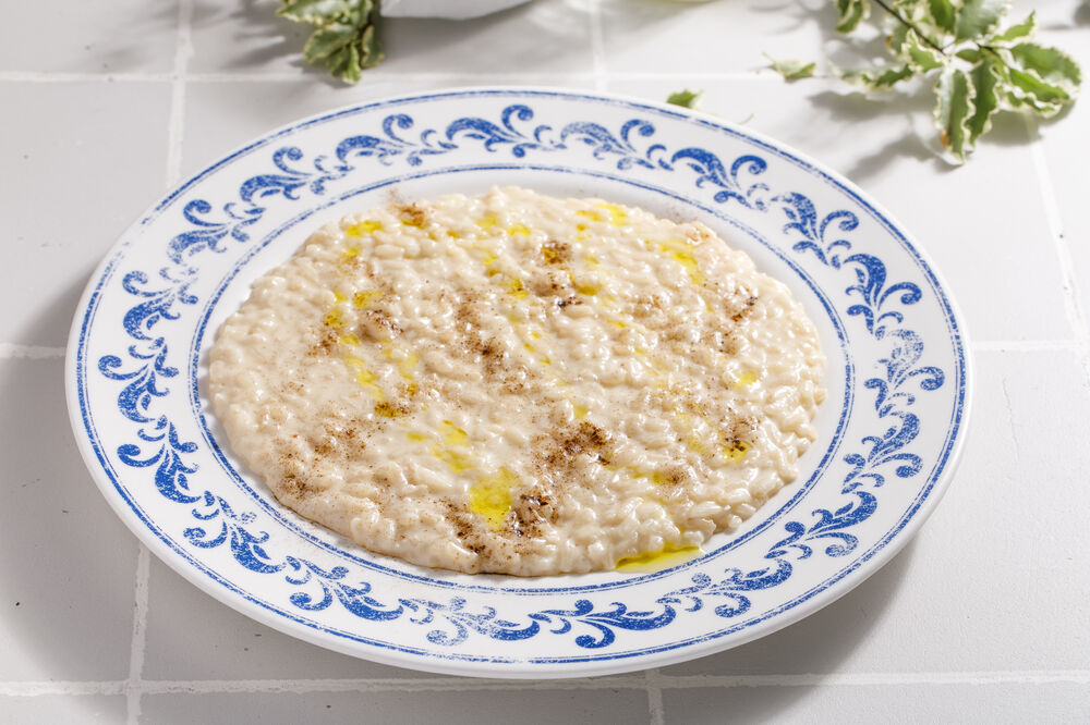 Cheese risotto with truffle powder