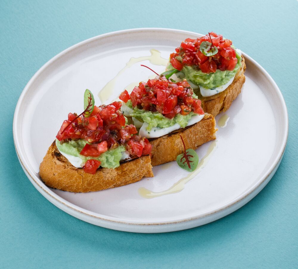 Bruschetta with tomatoes and guacamole
