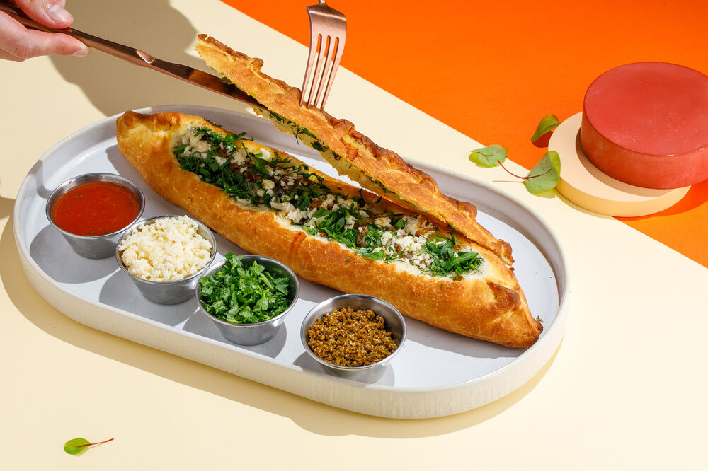 Crispy boat with lamb kebab with cheese and herbs