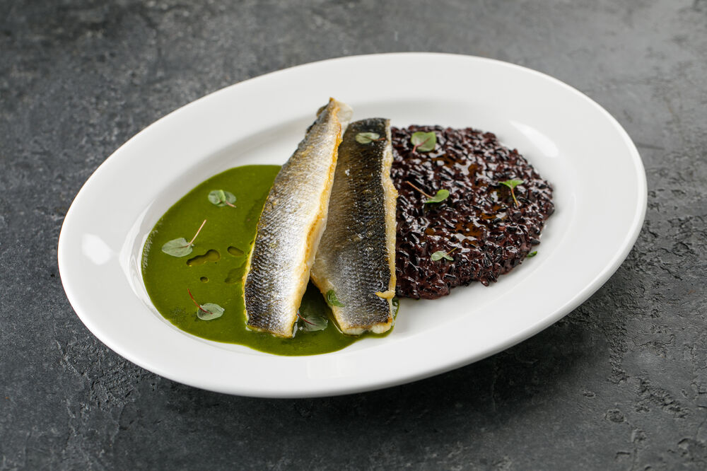 Seabass with nero venere rice and green curry