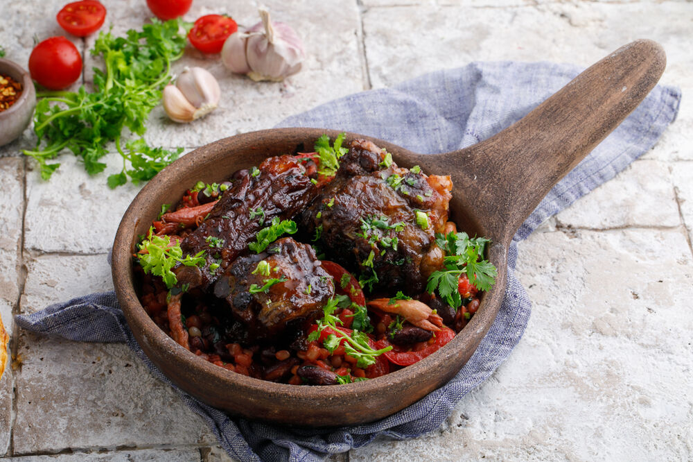 Oxtails with wheat and vegetables in Saperavi sauce