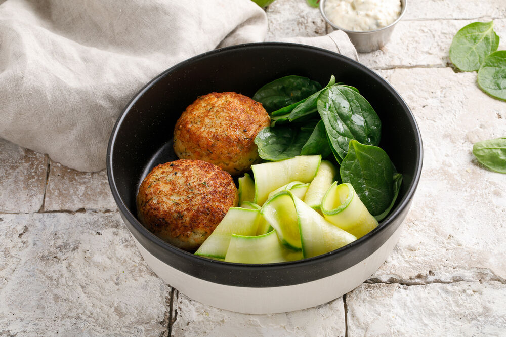 Fish cutlets with zucchini and spinach