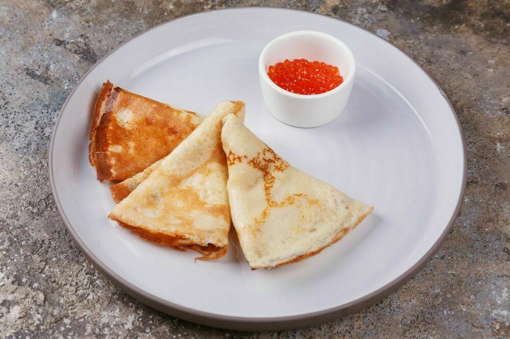 Pancakes with red caviar