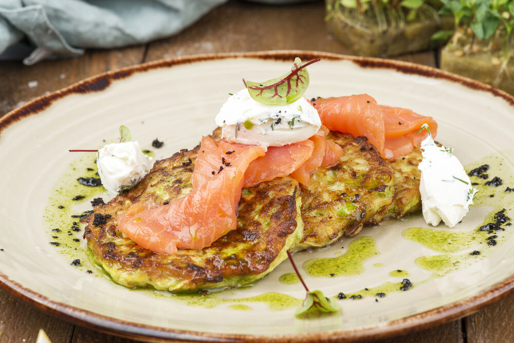 Zucchini pancakes with salmon