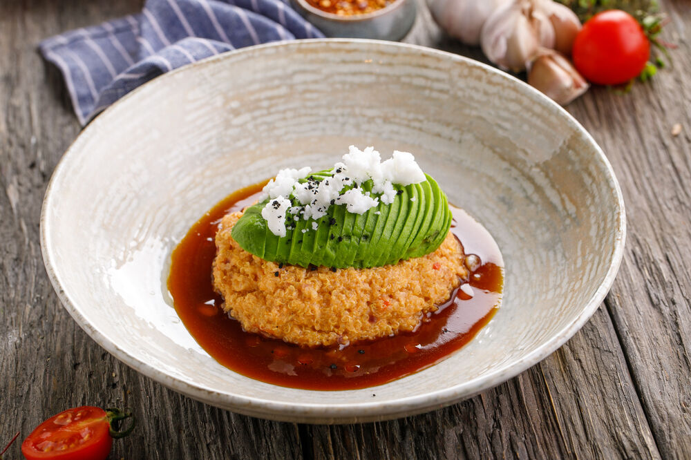 Quinoa with avocado and vegetable demiglas
