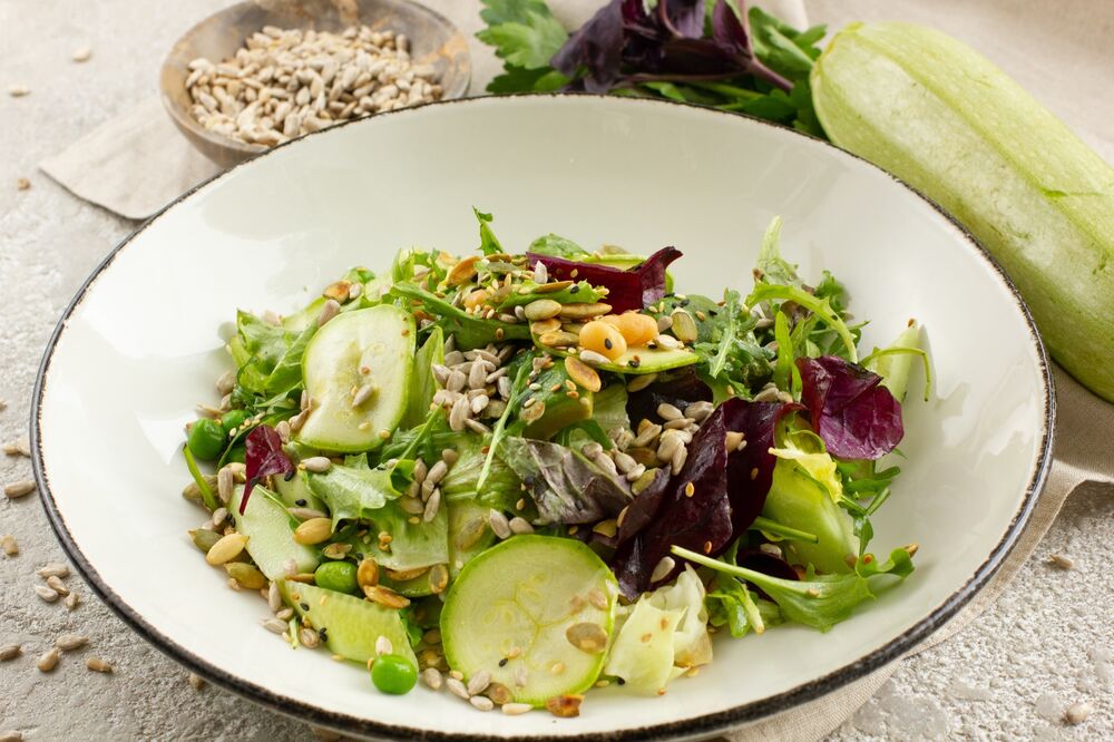 Salad with zucchini, avocado and seeds