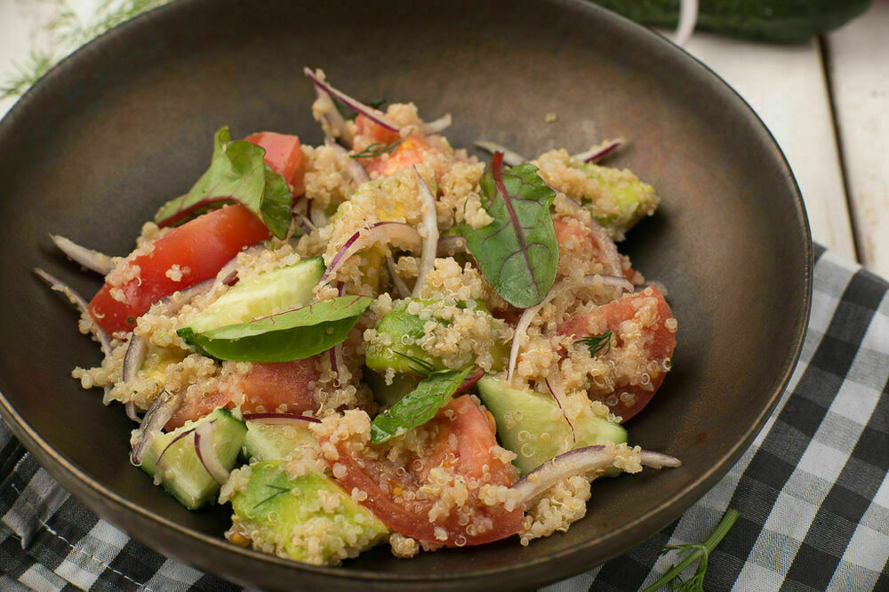 Salad with quinoa, avocado and mustard dressing