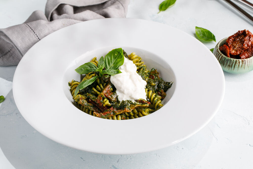 Pasta with pesto and sun-dried tomatoes