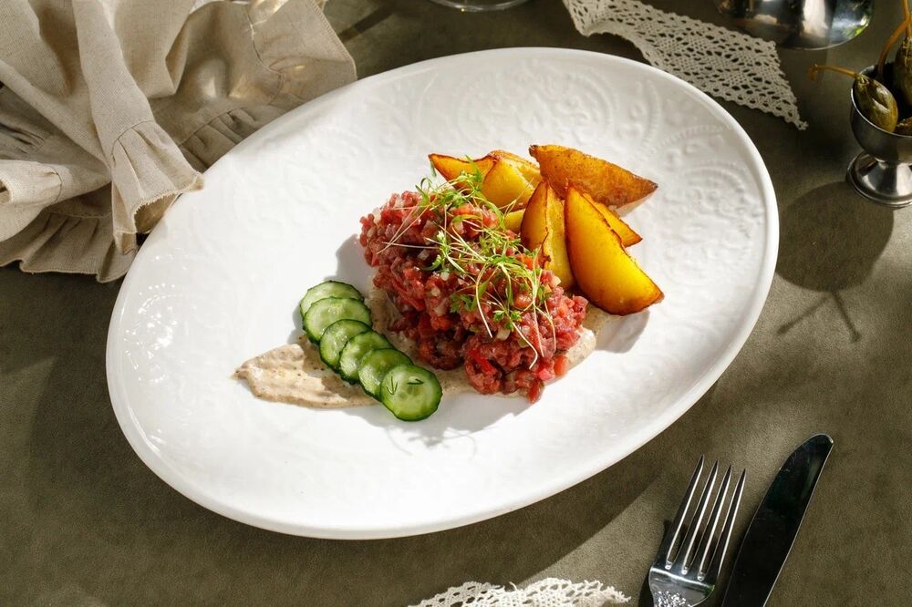  Beef tartare with pickled cucumber and anchovy