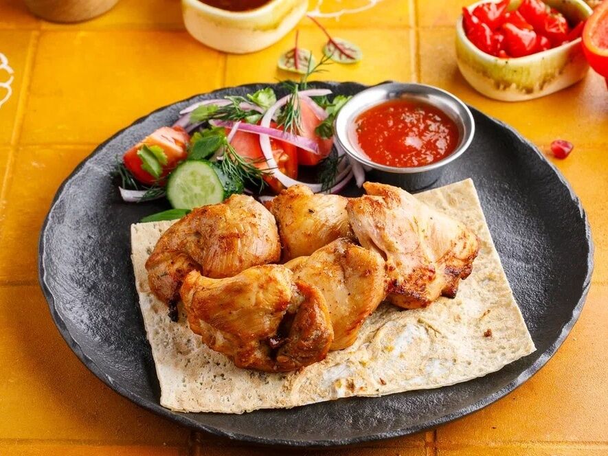 Shish-kebab of chicken leg quarter