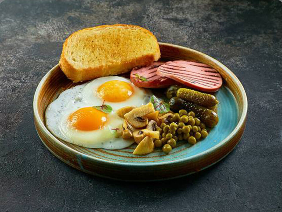 Homemade fried eggs with sausage