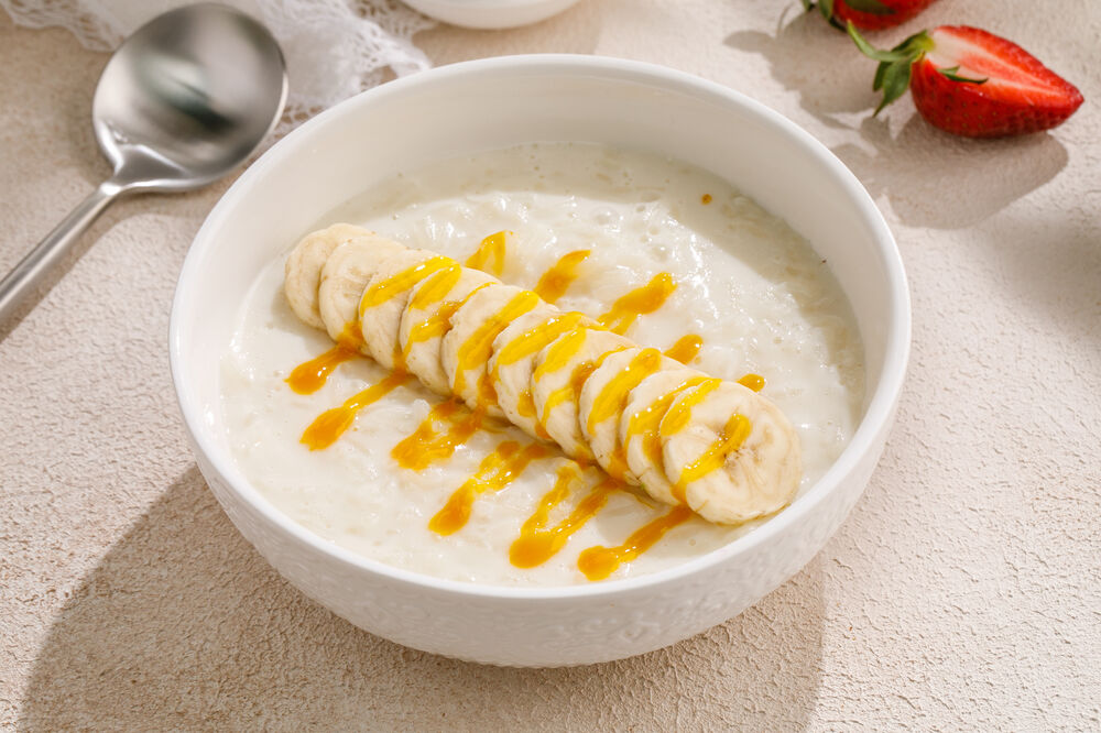 Rice porridge with coconut milk and banana