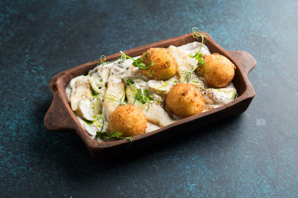 Stroganoff-styla pike perch with potato croquettes