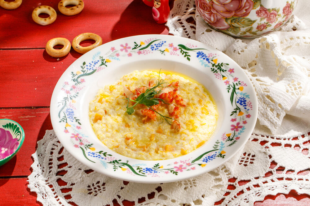 Millet porridge with pumpkin and crayfish tails