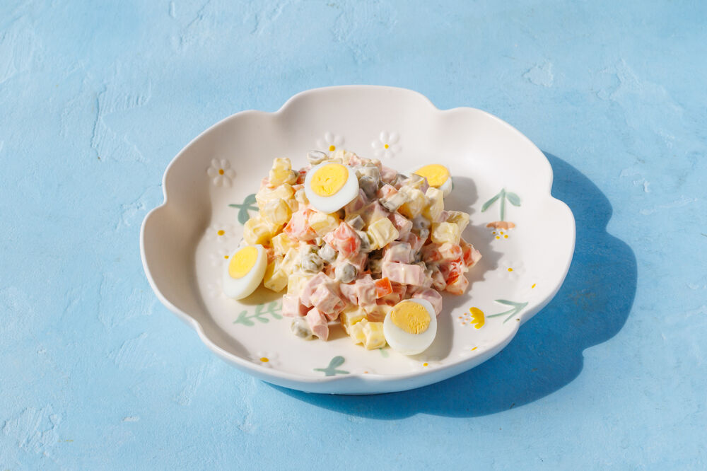 Olivier salad with sausage
