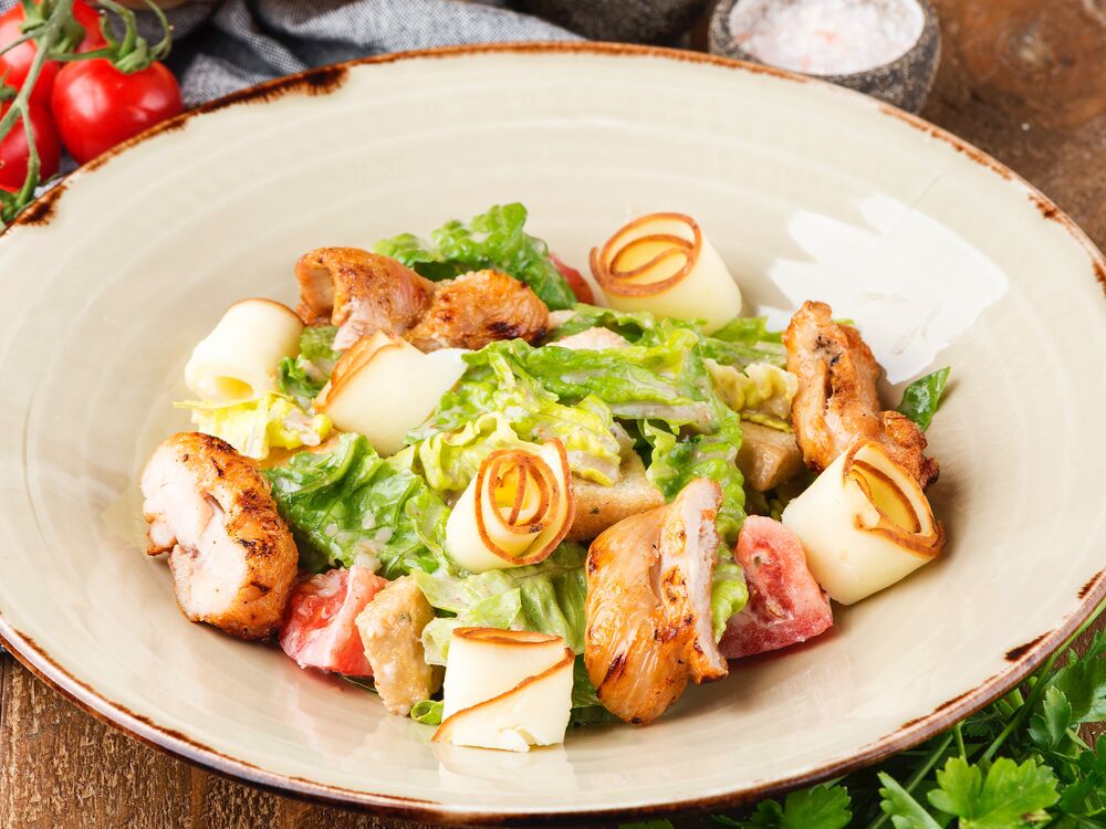 Warm salad with chicken and smoked Suluguni cheese