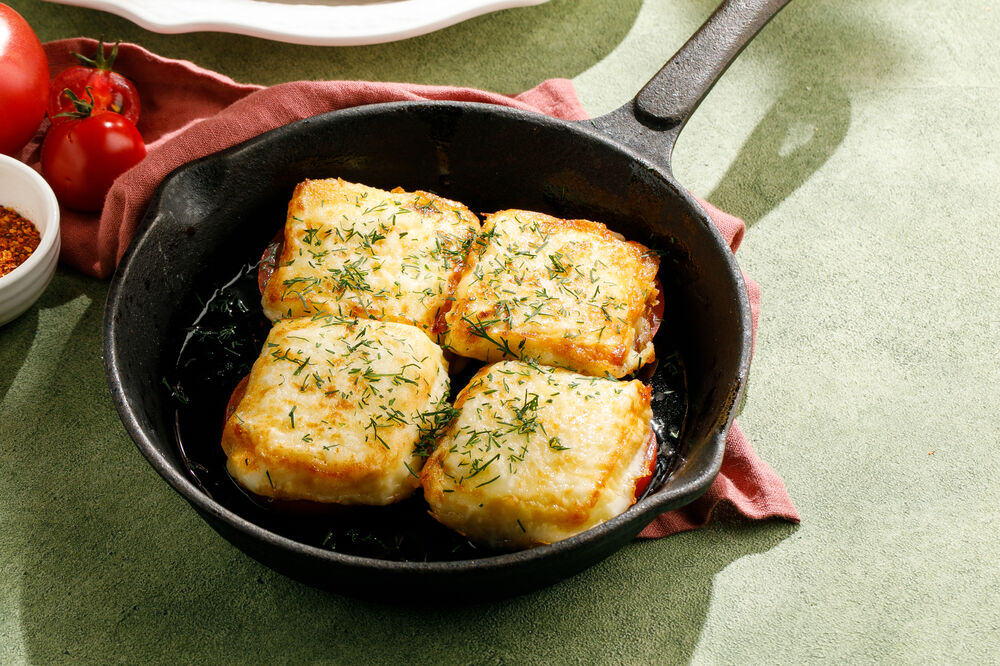 Grilled suluguni cheese with tomatoes