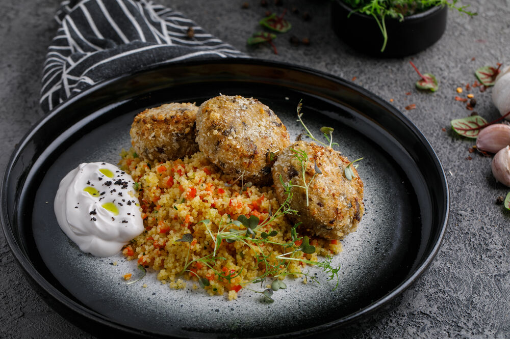 Cabbage cutlets with mushrooms and couscous