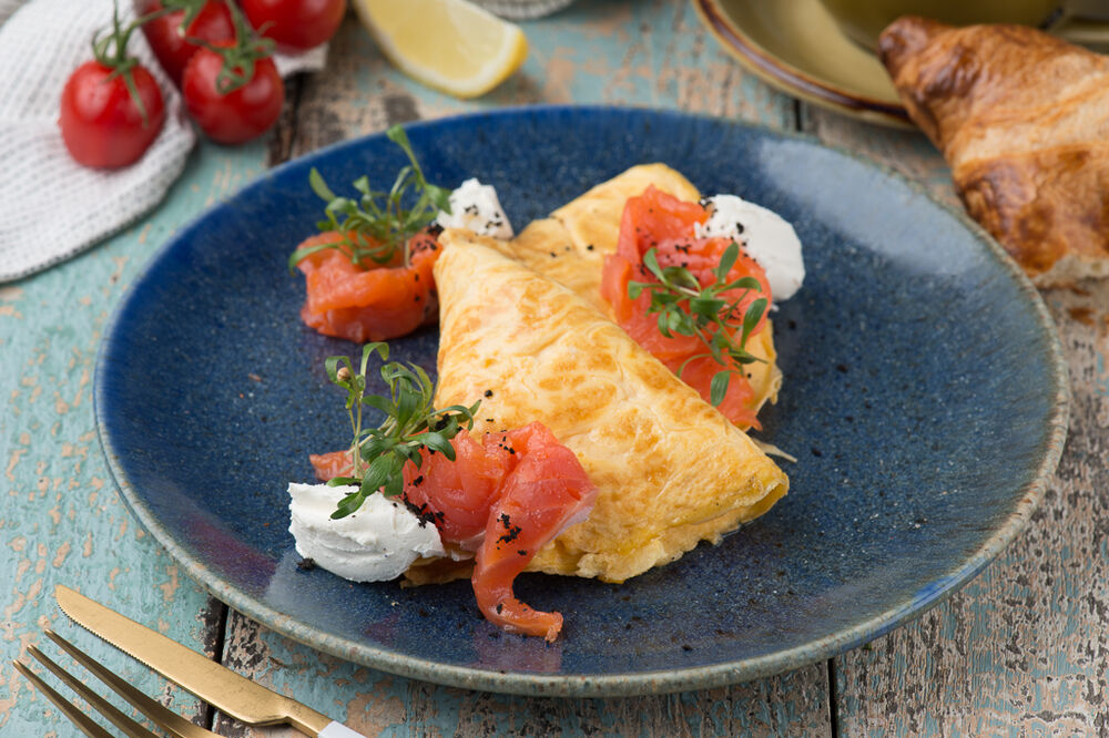 Omelette with tender smoked salmon and Сream cheese sauce