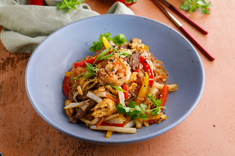 Rice noodles Pad Thai with beef and shrimp