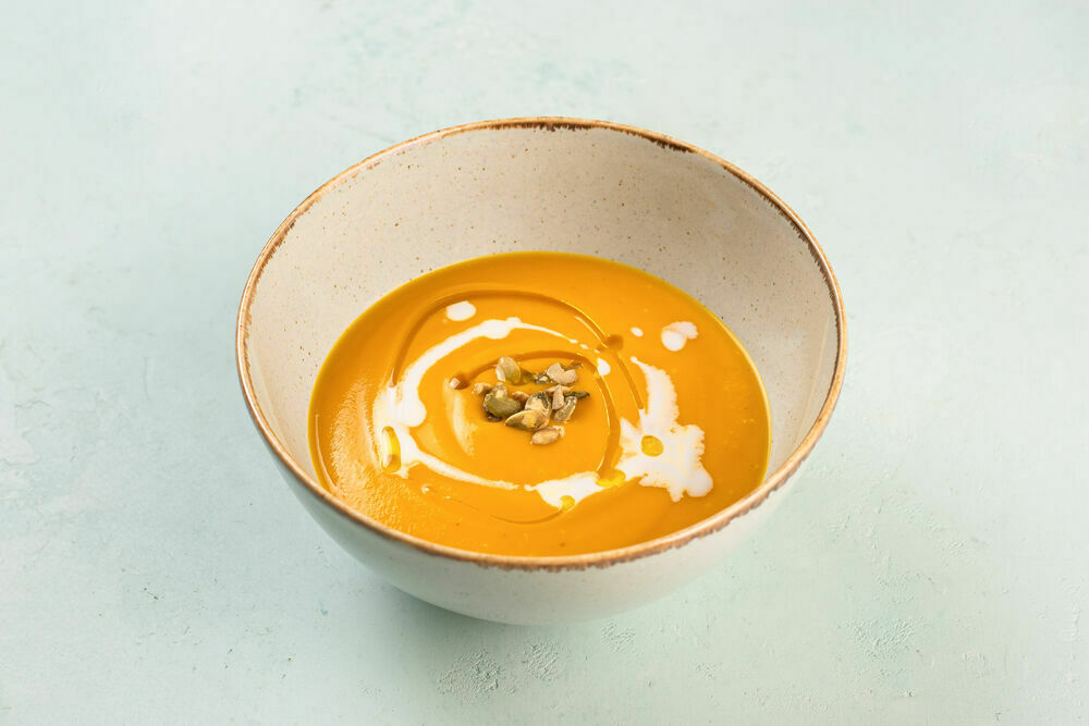 Cream of pumpkin soup with cumin and coconut milk