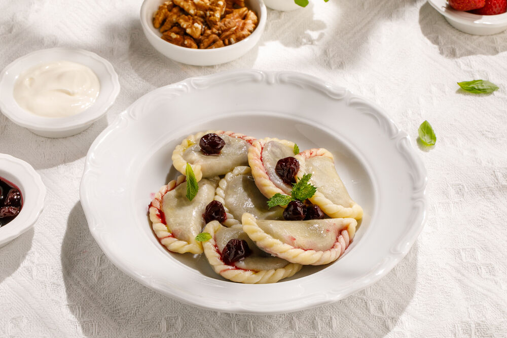 Homemade dumplings with cherries