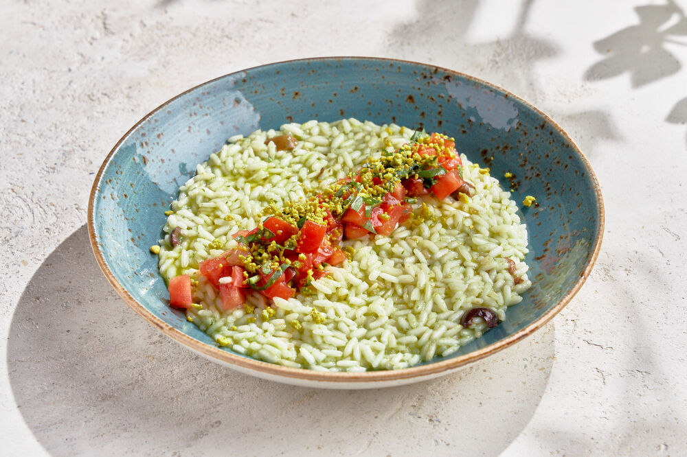 Risotto with olives, tomatoes and Pesto sauce