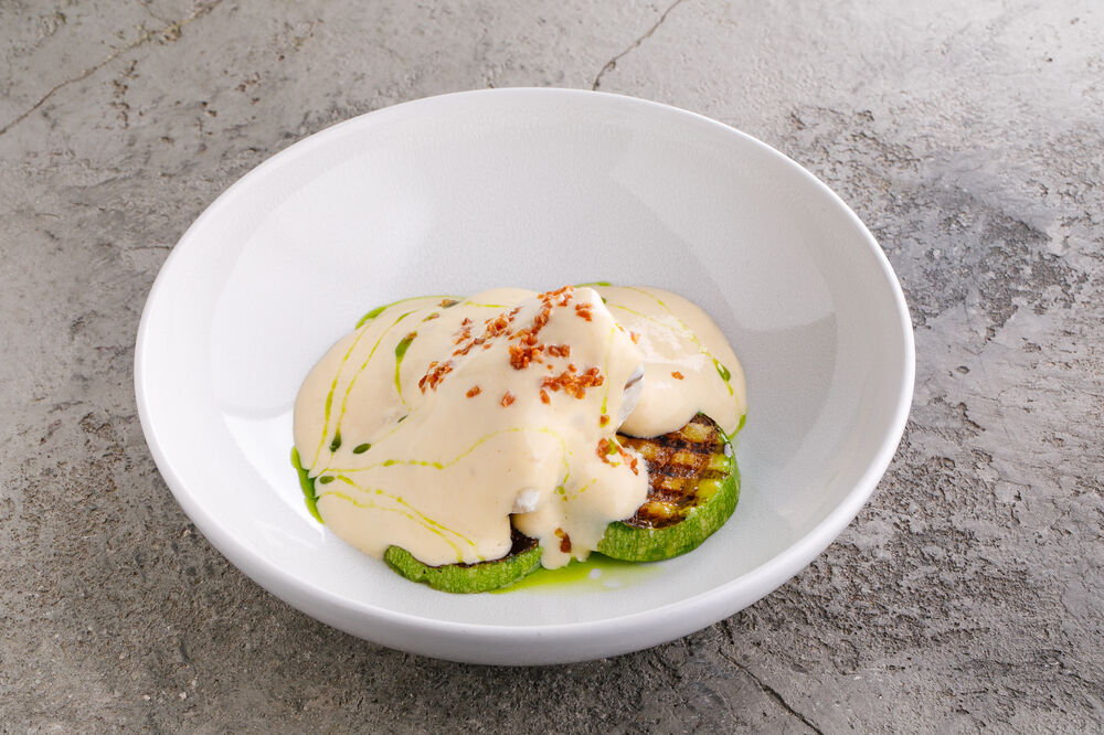 Cod with zucchini and hollandaise sauce