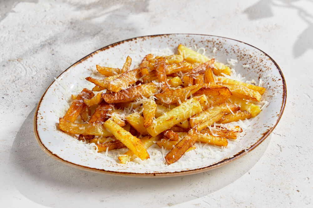 Fried potatoes with truffle oil and parmesan