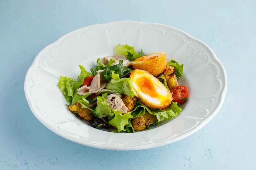 Salad with turkey, potatoes and egg
