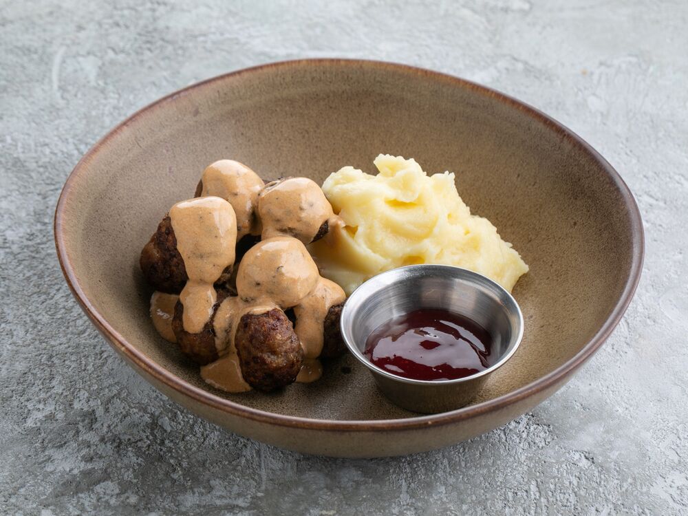 Swedish pork and beef meatballs with lingonberry sauce and mashed potatoes