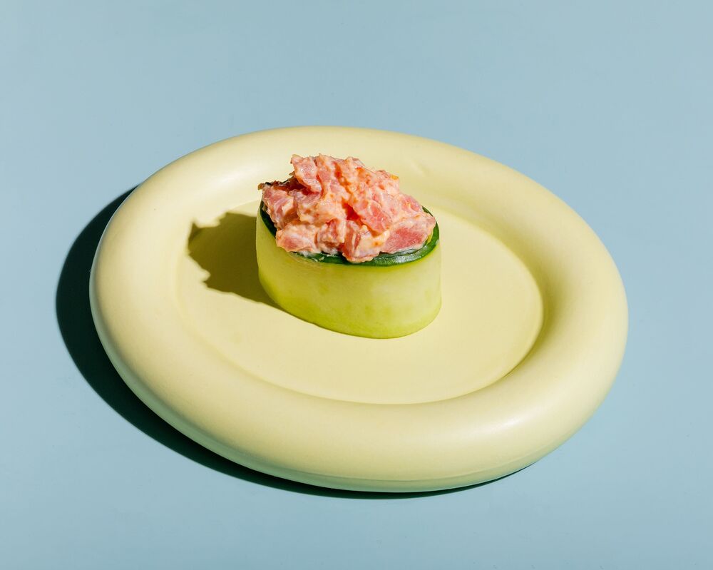 Sushi in cucumber with spicy tuna