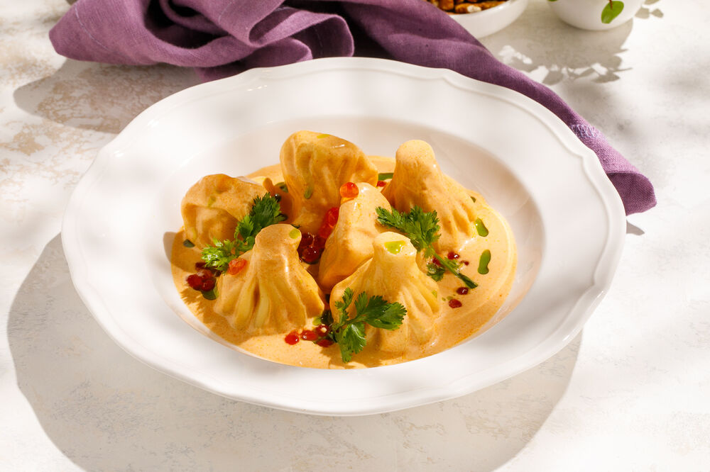 Patara khinkali with seafood in tom yum sauce