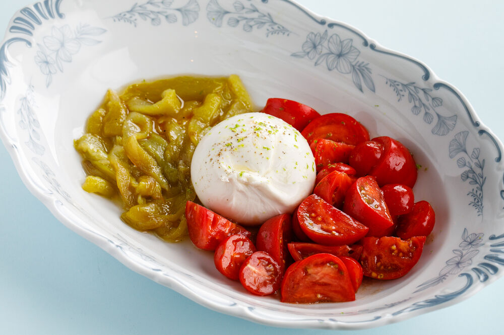 Burrata with tomatoes and roasted peppers